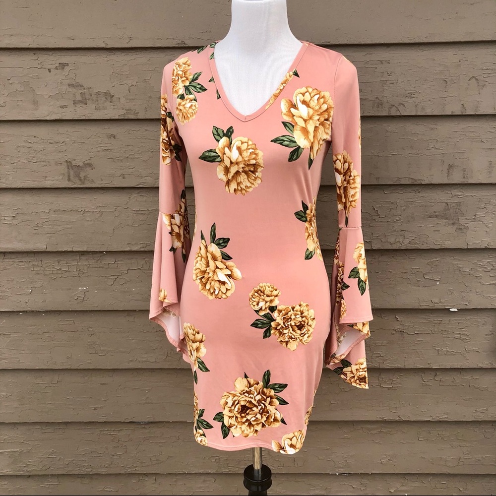 Sweet floral bodycon with bell sleeves!